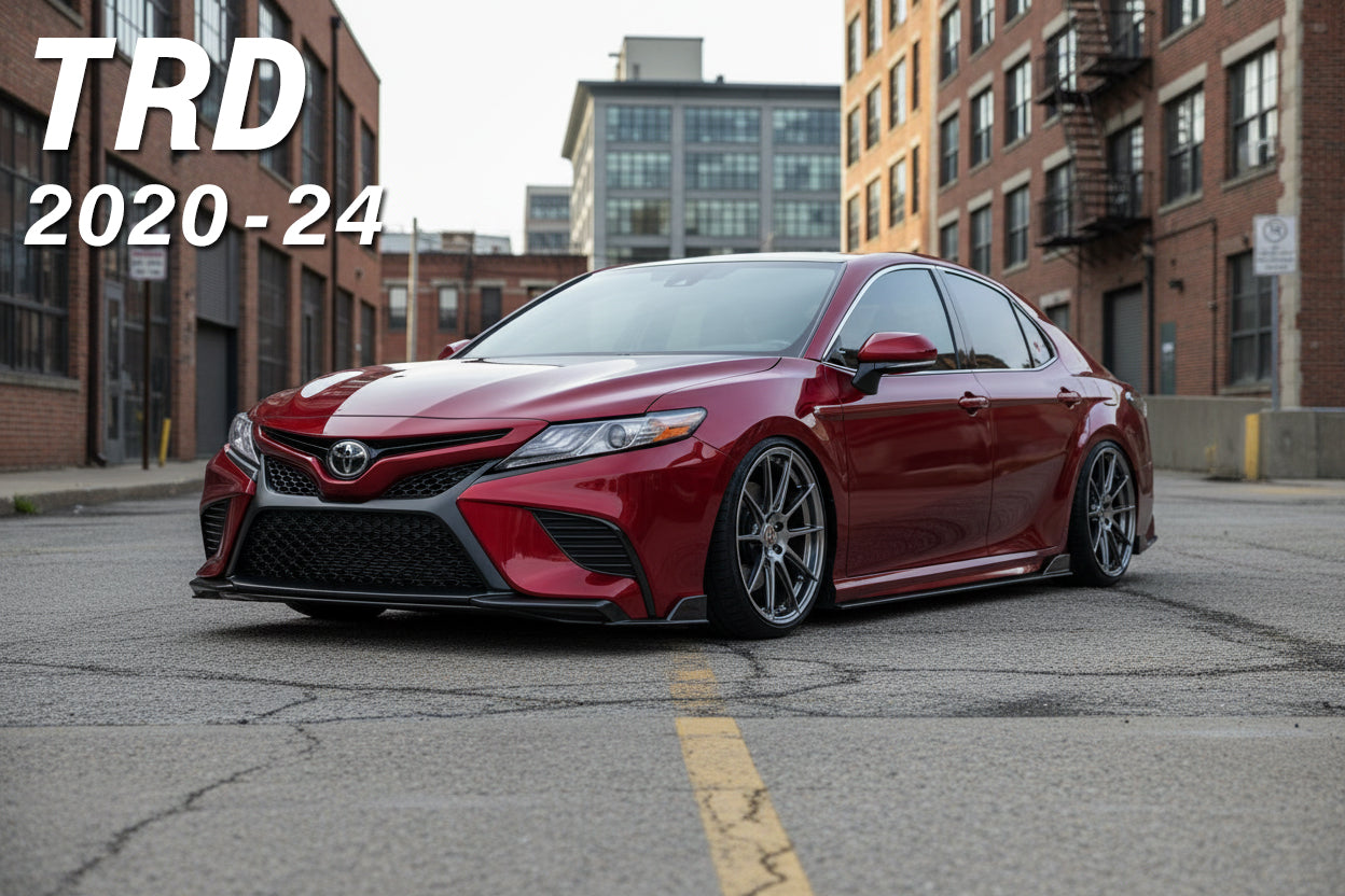 Toyota Camry TRD in Burgundy on a street with a city background.